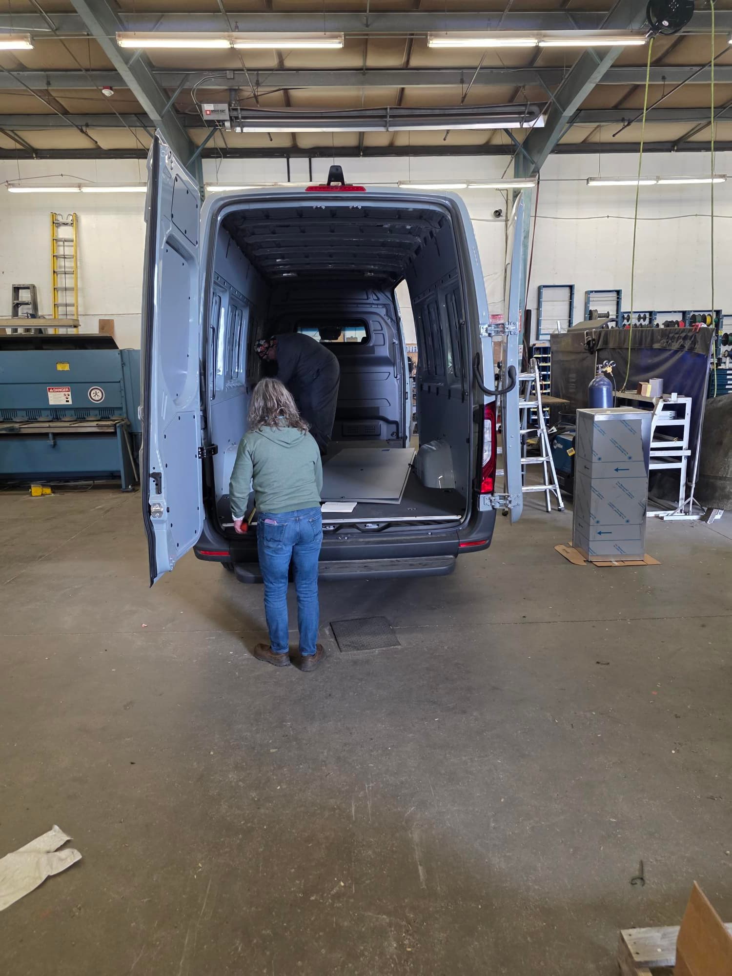 The rear doors open, showing how a vendor serves customers from the van